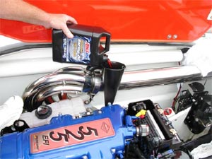 AMSOIL Dominator 15W-50 Racing Oil Poured into Mercury 525 Engine AMSOIL Dominator 15W-50 Racing Oil Poured into Mercury 525 Engine